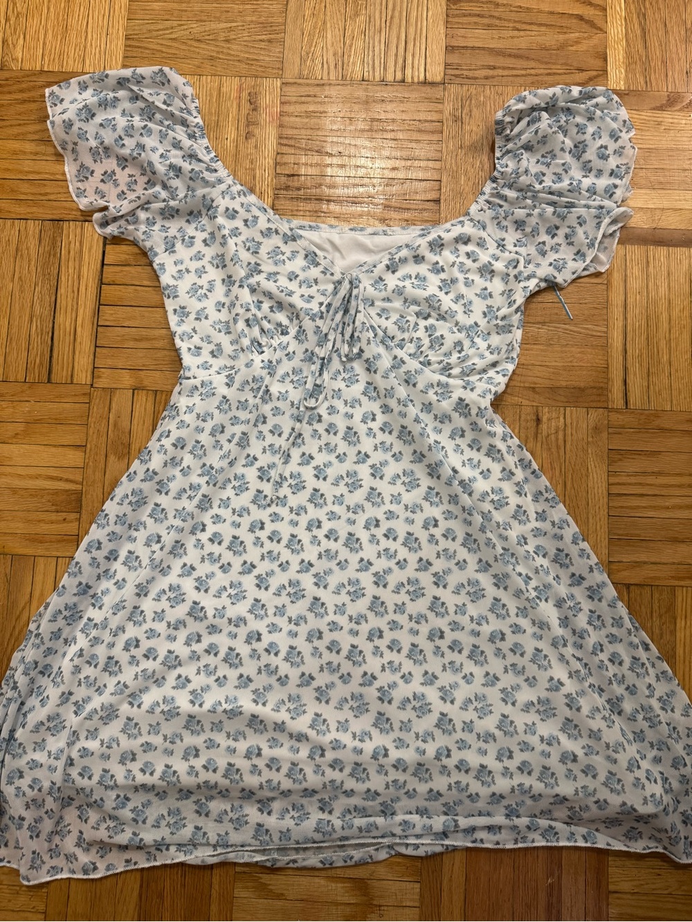 blue floral dress with a m neck line